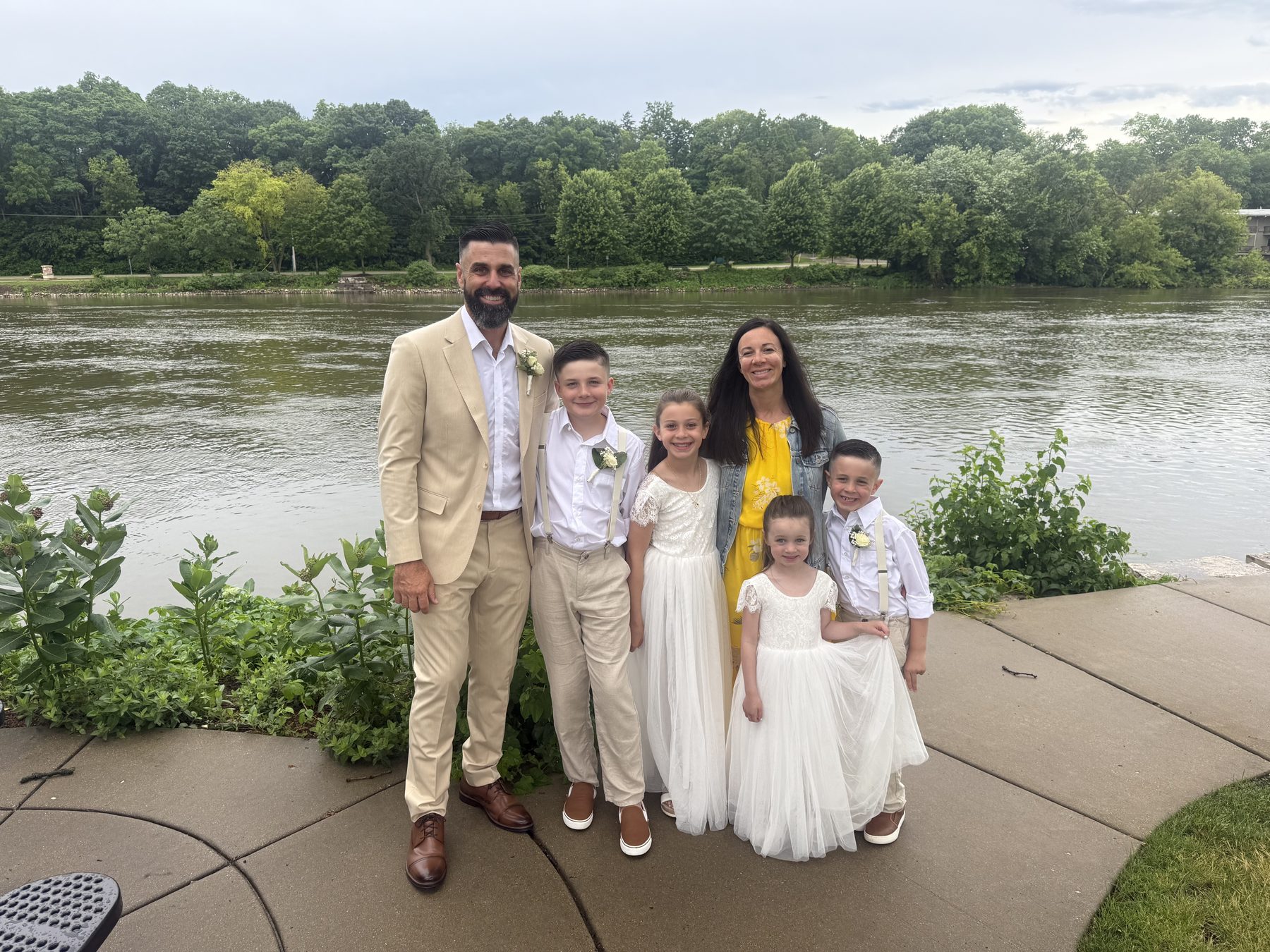 Matt Shoemaker, his wife and their four children by the river in Saline, Michigan